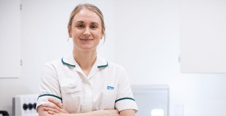 Health professional smiling.