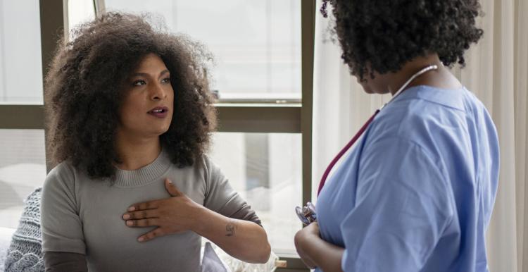 One woman speaking to a medical professional.