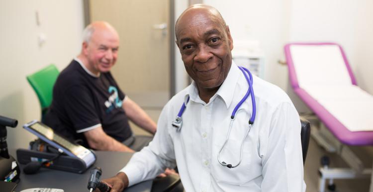 A picture of a doctor with a man