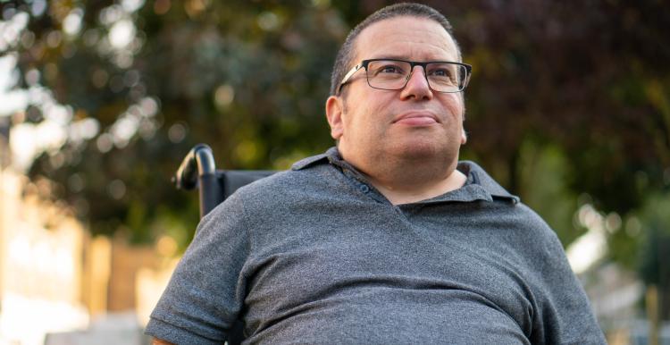 A man in a wheelchair.