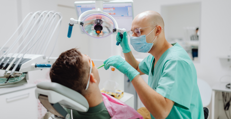 Dentist at work on a patient.