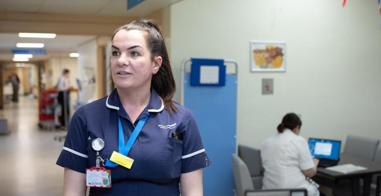 Nurse in a hospital corridor. 