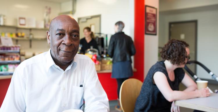 A man sat in a café.