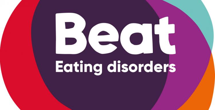 Beat Logo, Three Circles Overlapping, Multi Coloured, White Text Beat Eating Disorders