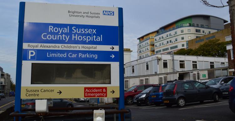 Royal Sussex County Hospital sign in front of the hospital