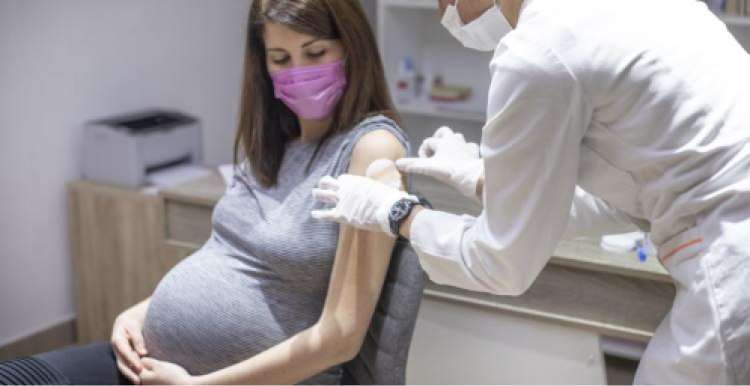 Woman having a vaccine