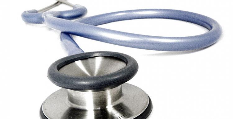 Close up low angle of stethoscope, Blue in colour, white background