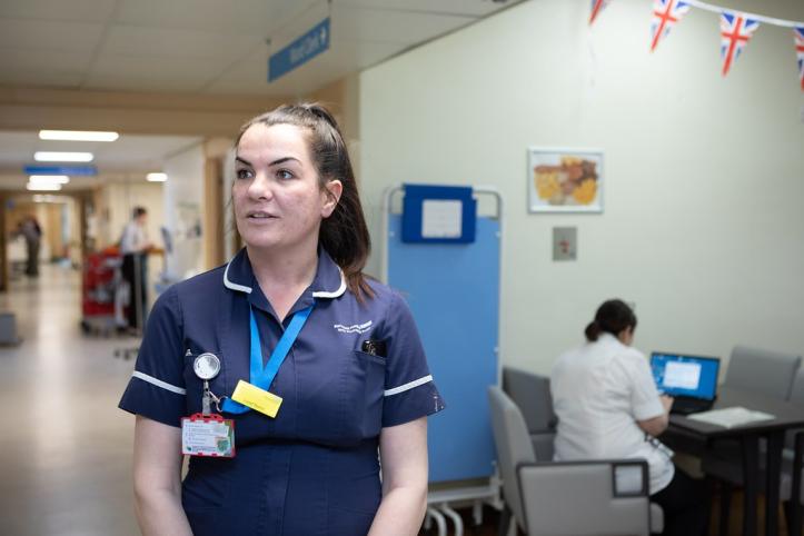 Nurse in a hospital corridor. 