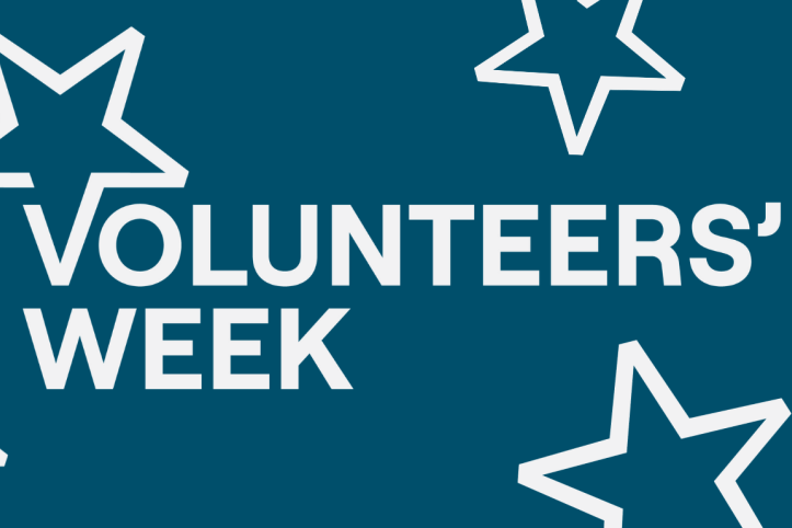 A dark blue text graphic featuring stars and wording saying: volunteers' week.