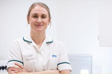 Health professional smiling. 