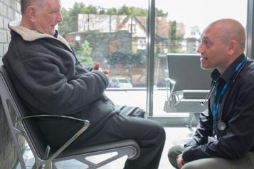 two men talking 