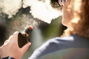 A person vaping.