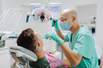 Dentist at work on a patient.