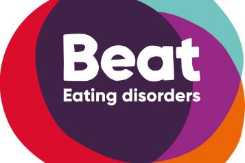 Beat Logo, Three Circles Overlapping, Multi Coloured, White Text Beat Eating Disorders