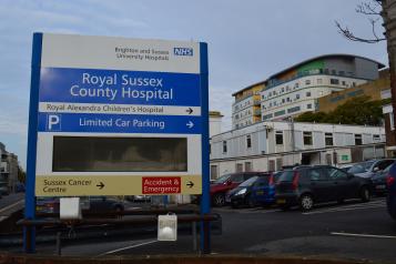 Royal Sussex County Hospital sign in front of the hospital