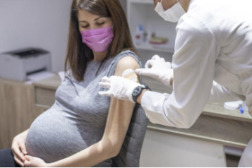 Woman having a vaccine