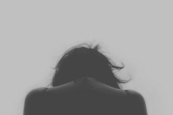 Black and White Image, Head and shoulders view from behind, centre frame