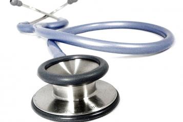 Close up low angle of stethoscope, Blue in colour, white background