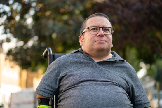 A man in a wheelchair.