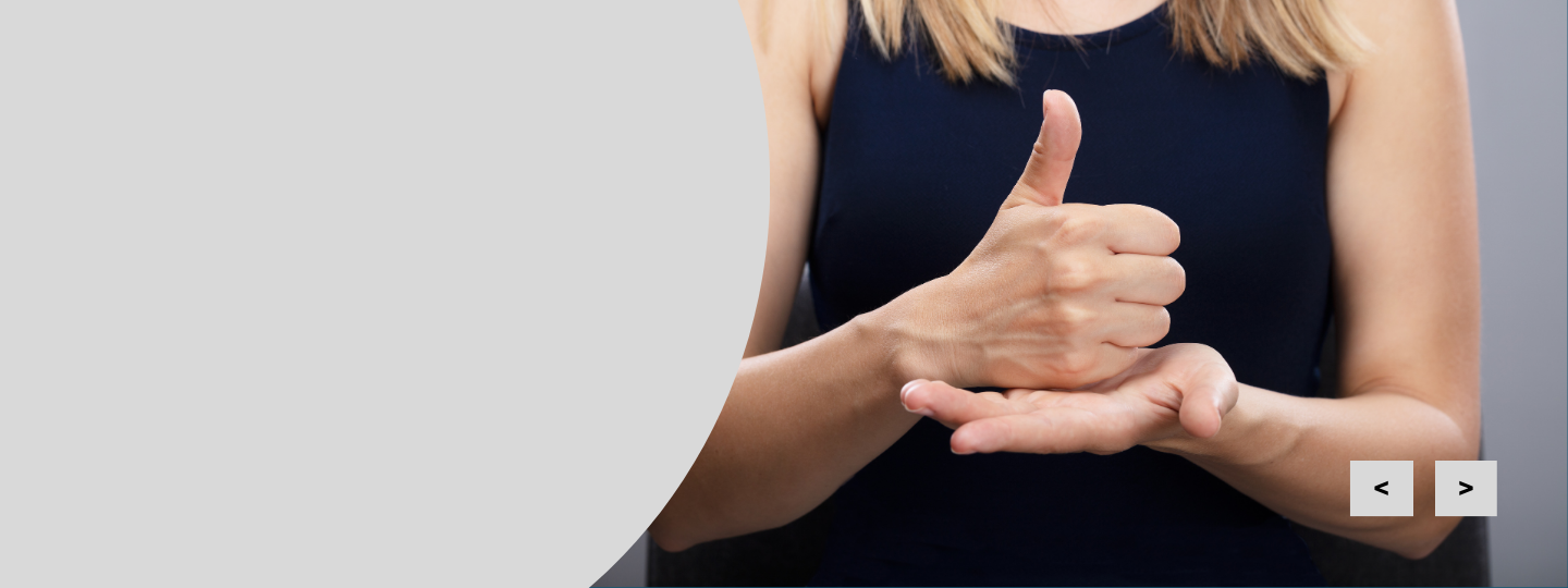 Person using British Sign Language to sign 'Help'