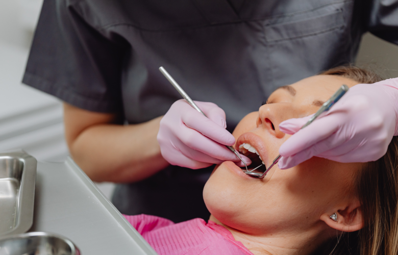 Woman being treated by a dentist