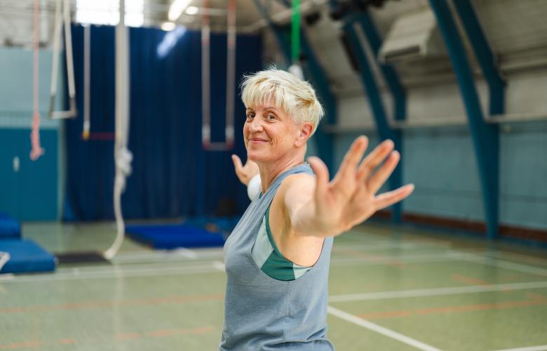 Woman exercising in a gym.