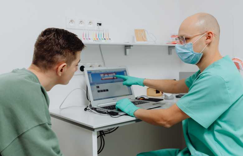 Dentist and a patient in a dental office. 