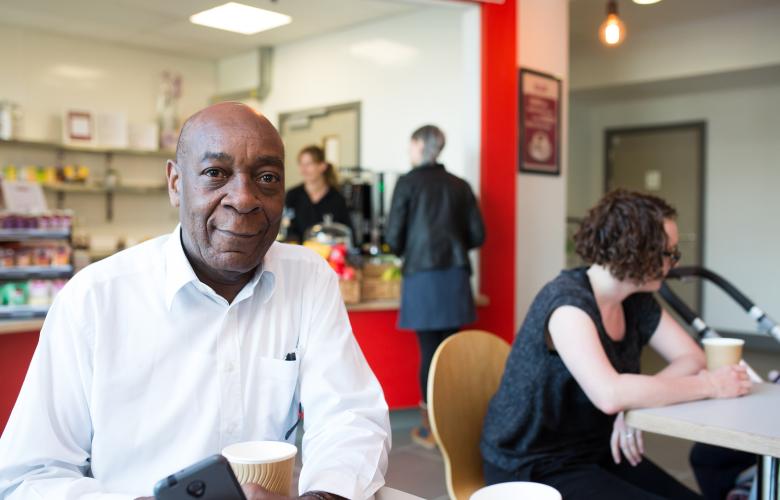 A man sat in a café.