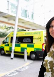 Lady next to ambulance