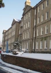 Front view of Brighton General, Snow Covers foreground and building